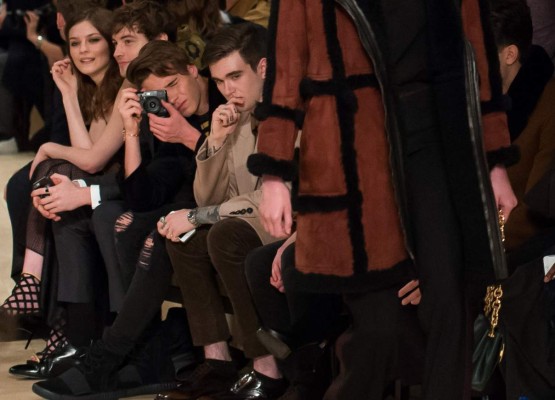 LONDON, ENGLAND - JANUARY 11: Brooklyn Beckham as Gabriel Day-Lewis looks on during the runway at the Burberry show during The London Collections Men AW16 at Kensington Gardens on January 11, 2016 in London, England. (Photo by Samir Hussein/WireImage)