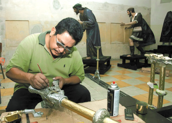 Cruz y palma, fe y devoción