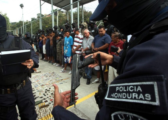 Droga y armas encuentran en allanamientos en Tegucigalpa