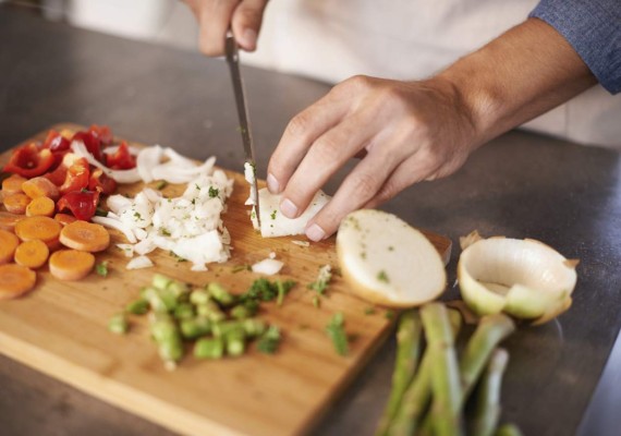 Cropped shot of a healthy man chopping vegtables