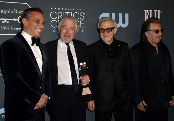 SANTA MONICA, CALIFORNIA - JANUARY 12: Sebastian Maniscalco, Robert De Niro, Harvey Keitel and Al Pacino, pose in the press room with the Best Acting Ensemble award for 'The Irishman' during the 25th Annual Critics' Choice Awards at Barker Hangar on January 12, 2020 in Santa Monica, California. Frazer Harrison/Getty Images/AFP