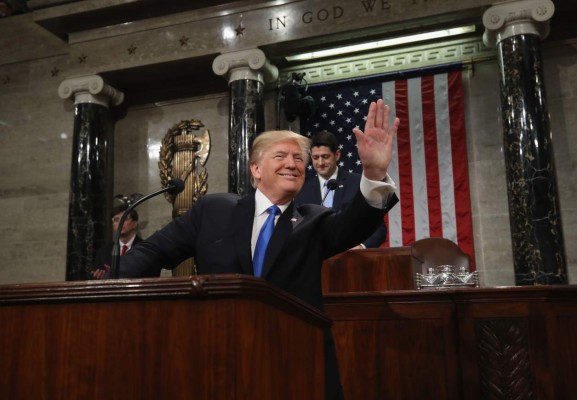 WASHINGTON, DC - JANUARY 30: U.S. President Donald J. Trump waves as he arrives during the State of the Union address in the chamber of the U.S. House of Representatives January 30, 2018 in Washington, DC. This is the first State of the Union address given by U.S. President Donald Trump and his second joint-session address to Congress. Win McNamee/Getty Images/AFP== FOR NEWSPAPERS, INTERNET, TELCOS & TELEVISION USE ONLY ==