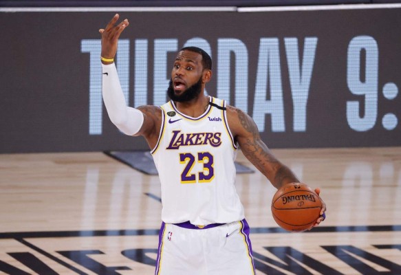 LAKE BUENA VISTA, FLORIDA - OCTOBER 04: LeBron James #23 of the Los Angeles Lakers gestures during the second half against the Miami Heat in Game Three of the 2020 NBA Finals at AdventHealth Arena at ESPN Wide World Of Sports Complex on October 04, 2020 in Lake Buena Vista, Florida. NOTE TO USER: User expressly acknowledges and agrees that, by downloading and or using this photograph, User is consenting to the terms and conditions of the Getty Images License Agreement. Kevin C. Cox/Getty Images/AFP