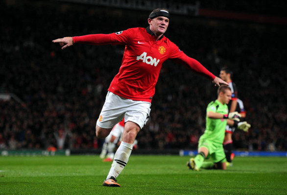 Rooney y Van Persie dan la victoria al Manchester United