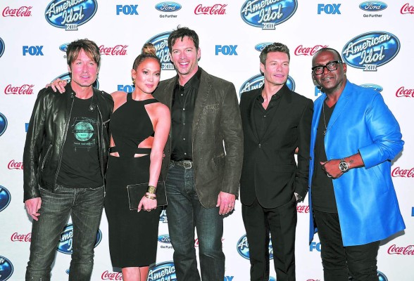 WEST HOLLYWOOD, CA - FEBRUARY 20: (L-R) Judges Keith Urban, Jennifer Lopez, Harry Connick, Jr. host Ryan Seacrest and Randy Jackson attend FOX's 'American Idol XIII' finalists party at Fig & Olive Melrose Place on February 20, 2014 in West Hollywood, California. (Photo by Kevin Winter/Getty Images)