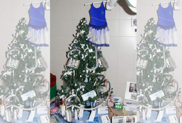 Medicinas y traje de palillona adornan árbol del IHSS