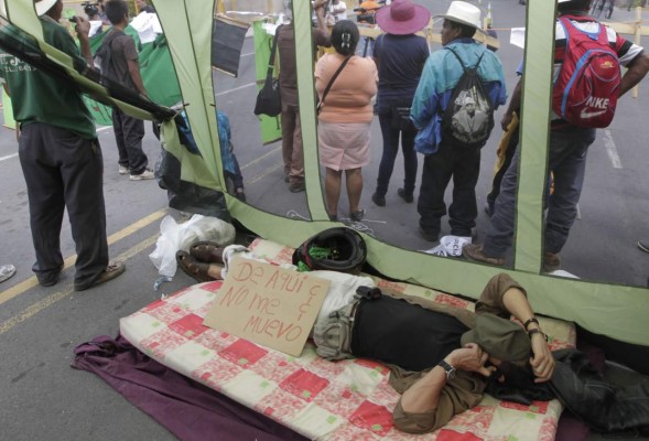 Reubican a hondureños 'indignados' en Tegucigalpa