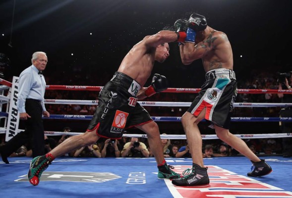 Juan Manuel Márquez derrota a Mike Alvarado y va por Pacquiao