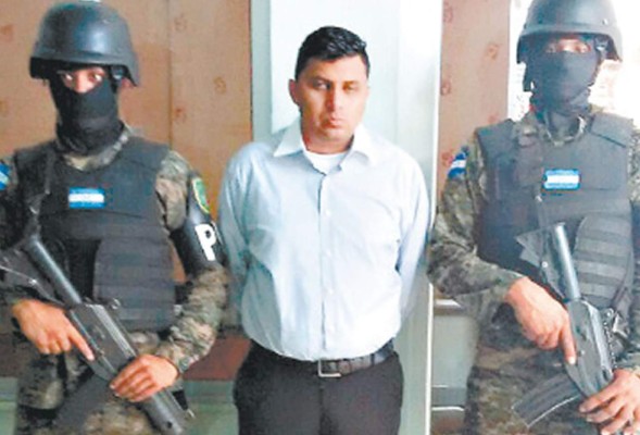 Capturan hondureño en un banco con cheque millonario