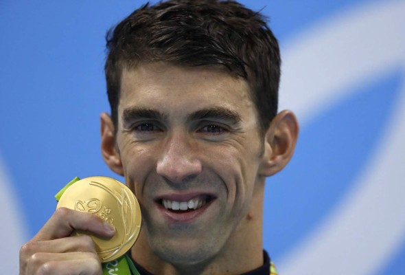 Phelps suma 25 medallas tras lograr el oro en los 4x200 libre