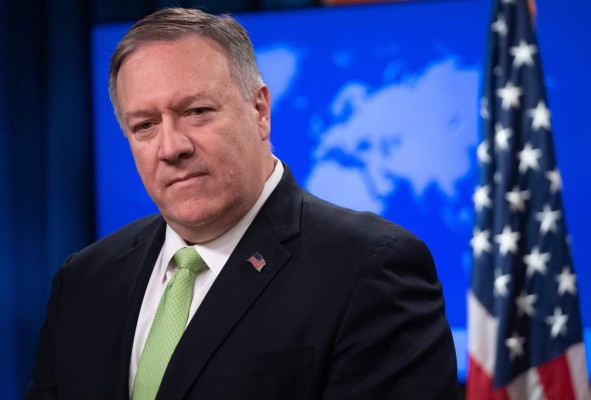 (FILES) In this file photo taken on December 11, 2019 US Secretary of State Mike Pompeo holds a press conference at the State Department in Washington, DC. - US Secretary of State Mike Pompeo said January 3, 2020 that Iranian military commander Qasem Soleimani was planning imminent action that threatened American citizens when the general was killed in a US strike. (Photo by SAUL LOEB / AFP)