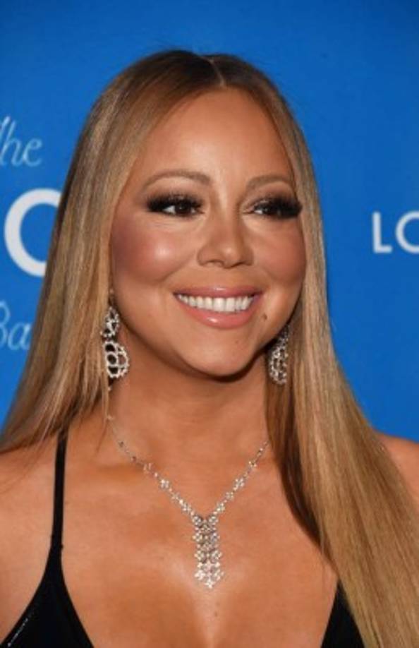 Mariah tiene muchas razones para sonreír, primero perdió las libras que le sobraban y está comprometida con un hombre que tiene una fortuna valorada en 4 mil 700 millones de dólares.