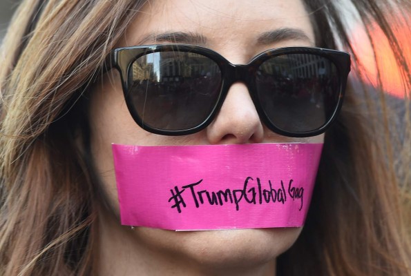 Women participate in a protest on 5th Avenue near Trump Tower in New York March 8, 2017 during a #DayWithoutAWoman protest in New York. / AFP PHOTO / TIMOTHY A. CLARY