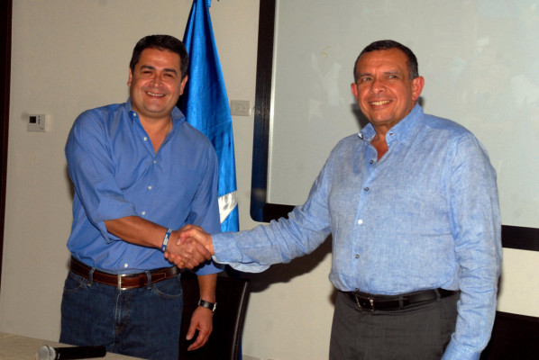 Juan Orlando Hernández y Lobo comienzan transición presidencial de Honduras