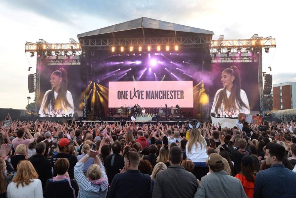 In this photograph released by One Love Manchester on June 4, 2017, US musicians Ariana Grande performs at the One Love Manchester benefit concert for the families of the victims of the May 22, Manchester terror attack, at Emirates Old Trafford in Greater Manchester on June 4, 2017. / AFP PHOTO / One Love Manchester / Dave Hogan for One Love Manchester / RESTRICTED TO EDITORIAL USE - MANDATORY CREDIT 'AFP PHOTO / ONE LOVE MANCHESTER / DAVE HOGAN' - NO MARKETING NO ADVERTISING CAMPAIGNS - DISTRIBUTED AS A SERVICE TO CLIENTS