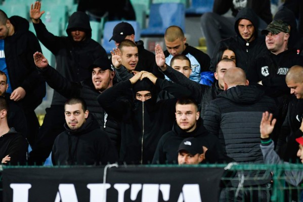 Bulgarian fans react during the Euro 2020 Group A football qualification match between Bulgaria and England at the Vasil Levski National Stadium in Sofia on October 14, 2019. (Photo by NIKOLAY DOYCHINOV / AFP)