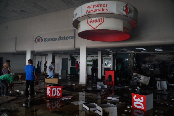 Vuelve la calma con negocios en la ruina en San Pedro Sula