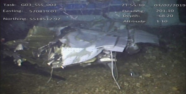 A handout video footage still image released by the UK Air Accidents Investigation Branch (AAIB) on February 25, 2019 and created on February 3, 2019 shows the cabin and break in fuselage from the wreckage of the Piper Malibu aircraft, N264DB, that crashed carrying footballer Emiliano Sala and pilot David Ibbotson lying on the seabed under the English Channel. - The plane carrying footballer Emiliano Sala that crashed in the Channel last month did not have a commercial licence, British investigators said Monday. But the Air Accidents Investigation Branch said the journey would have been allowed as a 'private' flight in which costs are shared between pilot and passenger. Pilot David Ibbotson was flying Sala to his new Premier League club Cardiff City from his previous side in Nantes in France on January 21 when the accident happened. (Photo by HO / various sources / AFP) / RESTRICTED TO EDITORIAL USE - MANDATORY CREDIT 'AFP PHOTO / AAIB ' - NO MARKETING NO ADVERTISING CAMPAIGNS - DISTRIBUTED AS A SERVICE TO CLIENTS