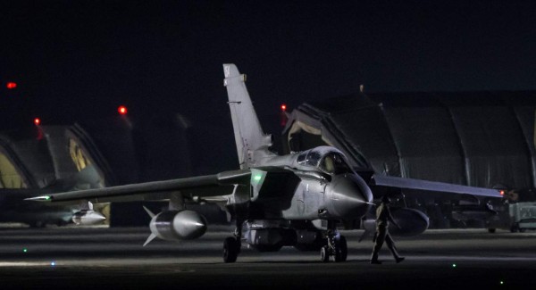 In a handout picture released by the British Ministry of Defence (MOD) on April 14, 2018 a Royal Air Force (RAF) Tornado GR4 aircraft, flown by 31 Squadron the Goldstars, taxis before taking off from the British base RAF Akrotiri in Cyprus on April 14, 2018 as part of a mission to conduct strikes in support of Operations in Syria. The United States, Britain and France carried out a wave of pre-dawn strikes against Syria's regime on April 14, 2018 in response to a suspected chemical weapons attack, lighting up the sky of Damascus as explosions shook the city. / AFP PHOTO / MOD / Cpl L Matthews / RESTRICTED TO EDITORIAL USE - MANDATORY CREDIT ' AFP PHOTO / CROWN COPYRIGHT 2018 / MOD / CPL L MATTHEWS ' - NO MARKETING NO ADVERTISING CAMPAIGNS - DISTRIBUTED AS A SERVICE TO CLIENTS - NO ARCHIVE - TO BE USED WITHIN 2 DAYS FROM APRIL 14, 2018 (48 HOURS), EXCEPT FOR MAGAZINES WHICH CAN PRINT THE PICTURE WHEN FIRST REPORTING ON THE EVENT /