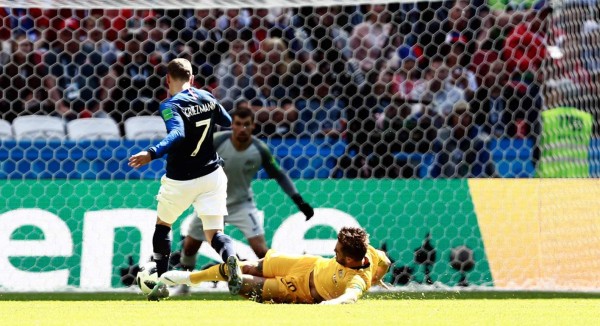 French referee Clement Turpin checks the VAR (Video Assistant Referee) equipment before the UEFA Champions League round of 16 second leg football match between Manchester City and Schalke 04 at the Etihad Stadium in Manchester, north west England, on March 12, 2019. (Photo by Paul ELLIS / AFP)