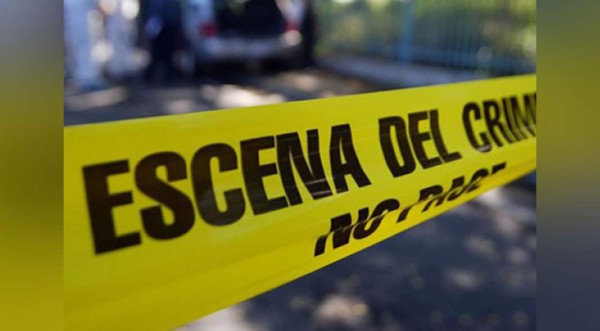 Matan a una persona y le dejan un letrero en Tegucigalpa
