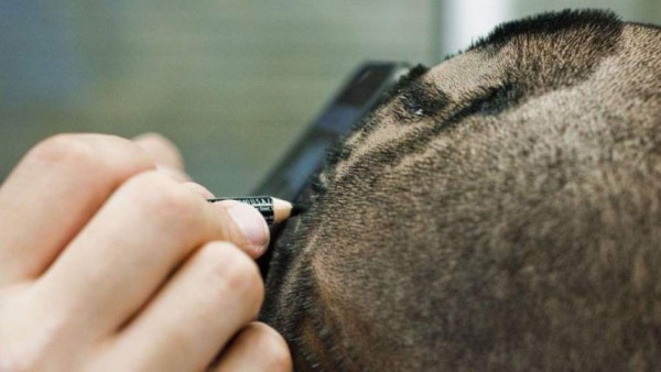 Fanático se diseña en el cabello la imagen de Lionel Messi