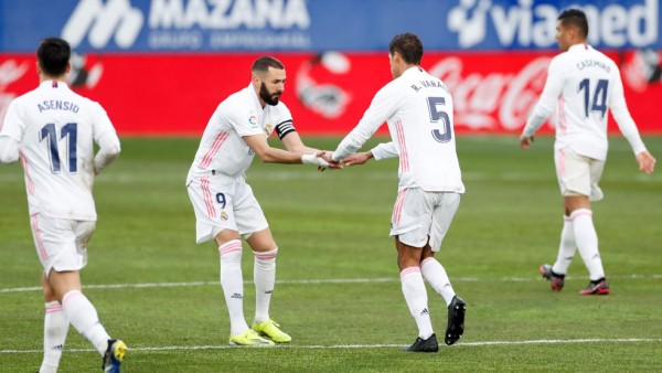 Real Madrid toma oxígeno venciendo al Huesca gracias a doblete de Varane