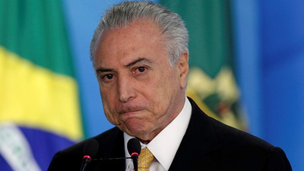 Temer es abucheado tras exponer sus reformas ante los exportadores brasileños