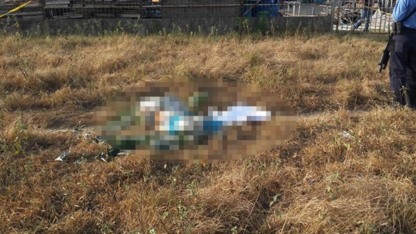 Hallan cadáver de joven 'encostalado' en San Pedro Sula