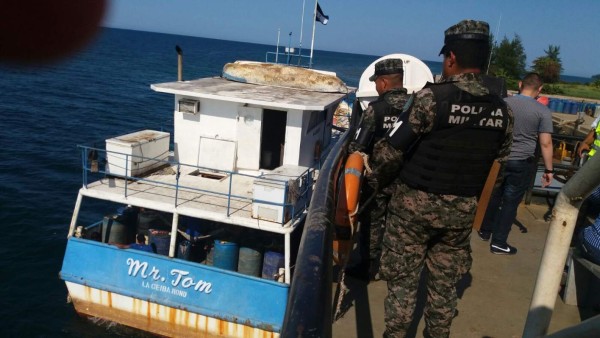 Hallan 1 millón de lempiras y 8,000 dólares en barco