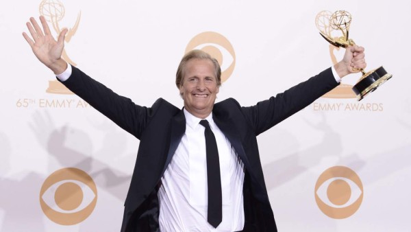Jeff Daniels poses with the award for outstanding lead actor in a drama series for his role on “The Newsroom at the 65th Primetime Emmy Awards at Nokia Theatre on Sunday Sept. 22, 2013, in Los Angeles. (Photo by Dan Steinberg/Invision/AP)