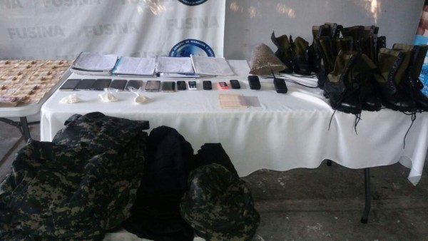 Capturan a contadora de la pandilla 18 con 113 mil lempiras, armas y notas extorsivas