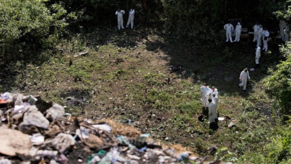 Identifican restos de sacerdote ugandés hallados en fosa de Guerrero