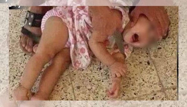 Horror: Divulgan foto de bebé a punto de ser decapitada por Isis