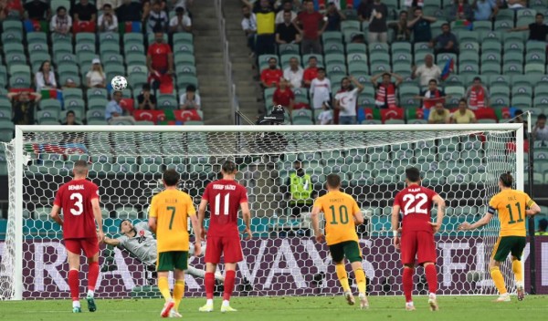 Wales' forward Gareth Bale (R) misses a penalty kick during the UEFA EURO 2020 Group A football match between Turkey and Wales at the Olympic Stadium in Baku on June 16, 2021. (Photo by OZAN KOSE / POOL / AFP)