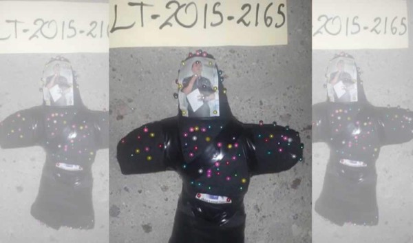 Hallan 'muñeco de vudú' con fotografía de Leonel Sauceda