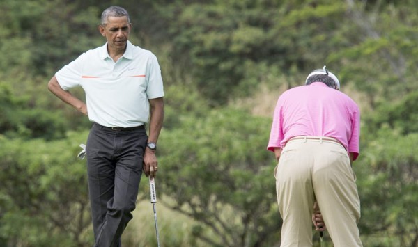 Mientras Malasia vive fuertes inundaciones su primer ministro juega al golf con Obama