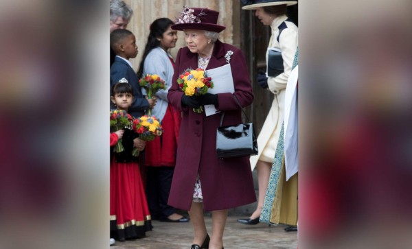 Meghan Markle participa en su primer acto oficial junto a la reina Isabel II