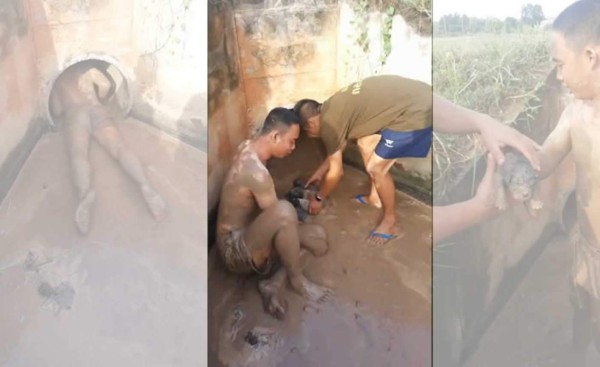 Este hombre fue grabado cuando se metió a un túnel lleno de heces humanas, para rescatar a cuatro perritos. Foto YouTube.