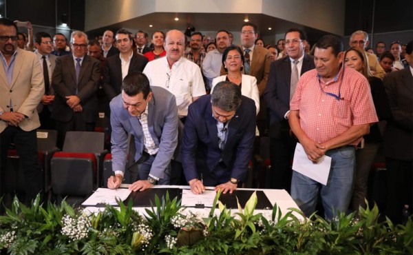 Presidente de Honduras sanciona Ley de Alivio de Deuda