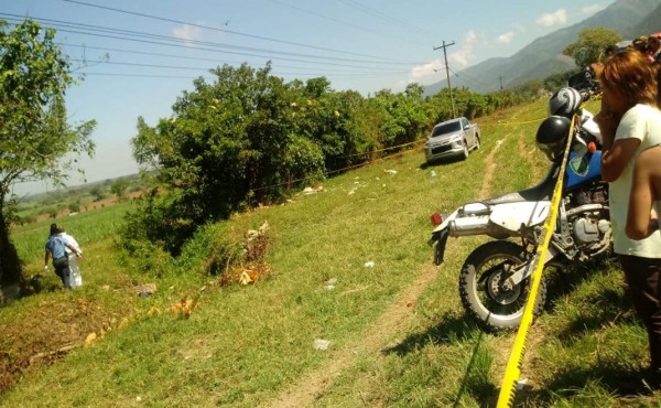 Matan a una mujer en El Progreso y le dejan un rótulo