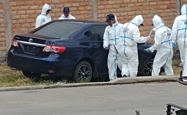 Policía inspecciona carro en el que supuestamente huyeron autores de masacre en Tegucigalpa