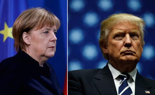 TOPSHOT - US President Donald Trump and German Chancellor Angela Merkel hold a joint press conference in the East Room of the White House in Washington, DC, on March 17, 2017. / AFP PHOTO / SAUL LOEB