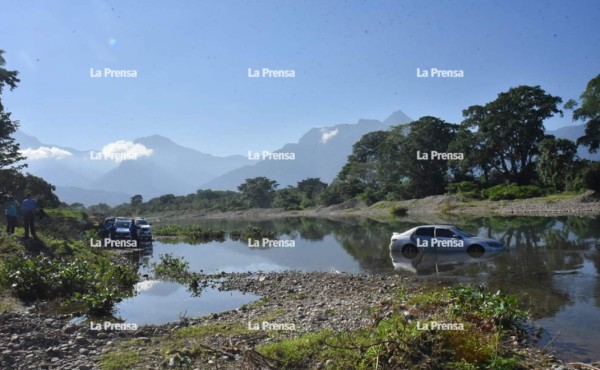 Matan a dos hombres y los tiran con todo y carro a río de La Ceiba