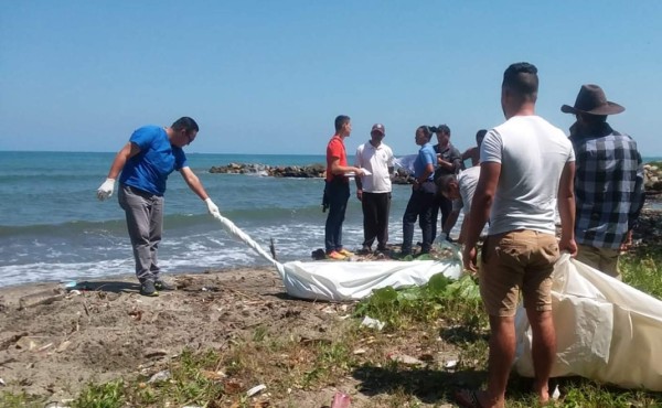 Encuentran enterrado el cadáver de un guardia de seguridad en playa de Omoa