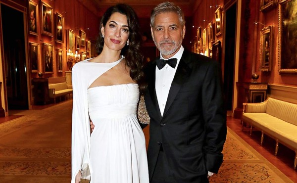 George y Amal Clooney cenan con realeza