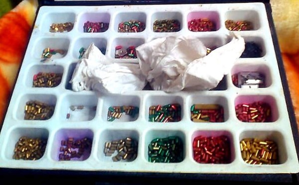 Hallan arma y municiones dentro de contenedor en la Portuaria