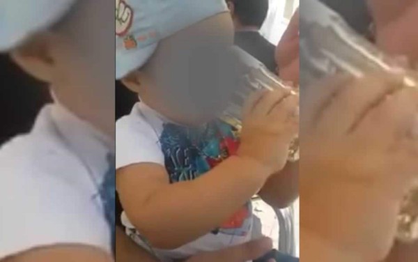Hombre obliga a bebé a tomar y a fumar