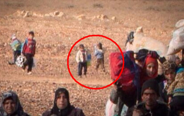 Fotos: Así huyen los niños de la guerra en Siria