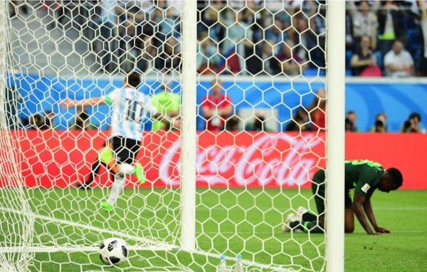 Barcelona's Argentinian forward Lionel Messi celebrates his goal during the Spanish league football match between FC Barcelona and Club Atletico de Madrid at the Camp Nou stadium in Barcelona on April 6, 2019. (Photo by LLUIS GENE / AFP)